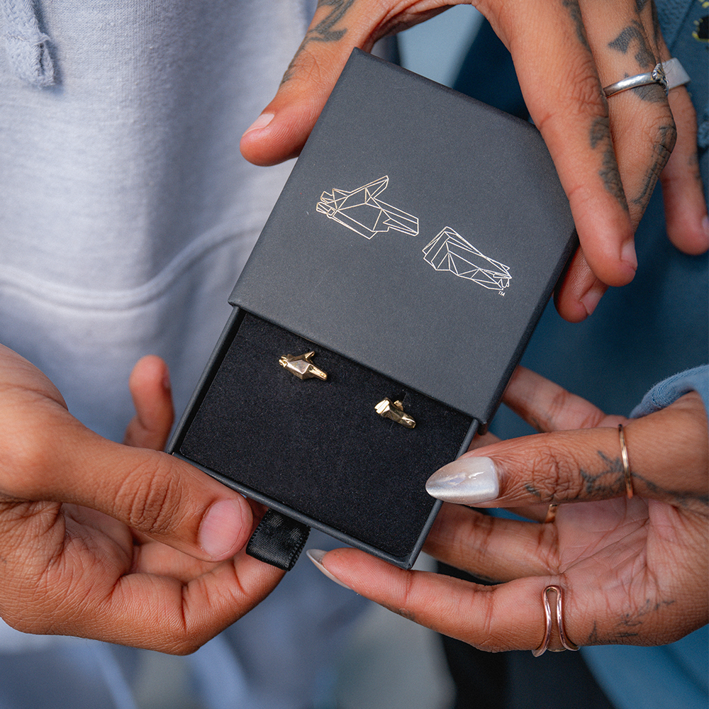 ’STAY GOLD’ PISTOL &amp; FIST EARRING SET